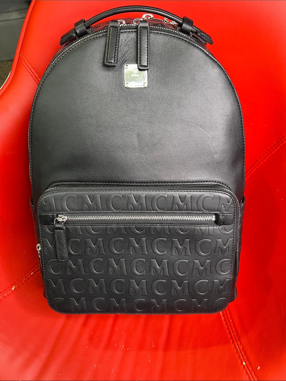 MCM Black Embossed Logo Leather Backpack